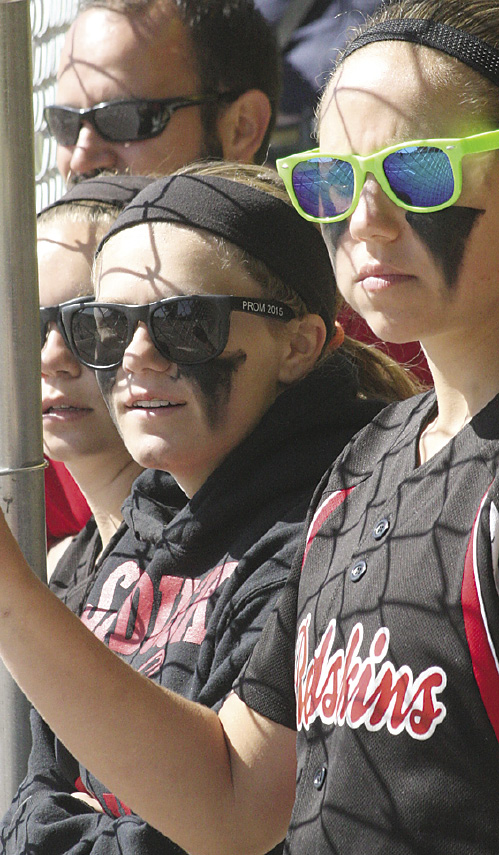 Battery mates Jenna Franzel (left) and pitcher Emily Cowley shed some tears at the end of their regional semi-final loss. 